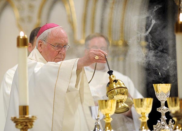 An Easter Candle near the altar at St. Joseph Cathedral signifies the year of the annual Chrism Mass. (Dan Cappellazzo/Staff Photographer)